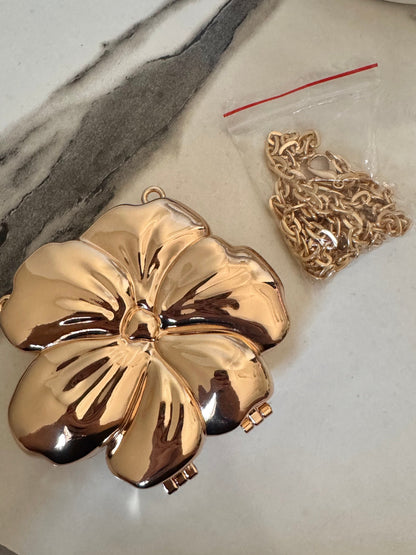 LuxeBloom Metallic Clutch